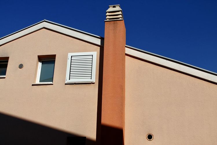 Low angle view of building against clear sky