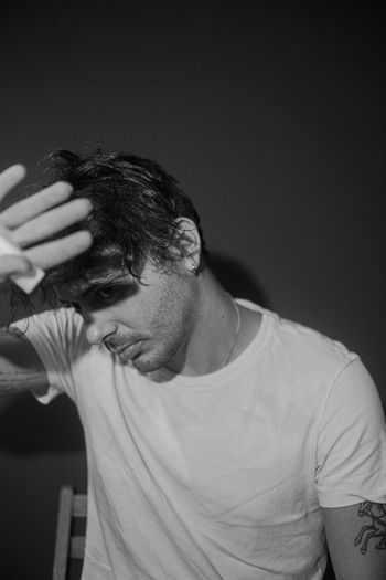 Midsection of man against white background