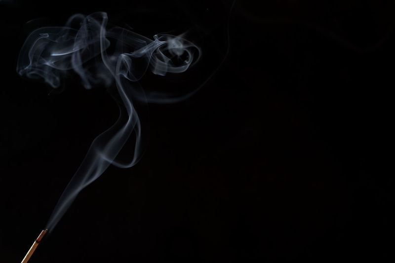 Close-up of smoke against black background