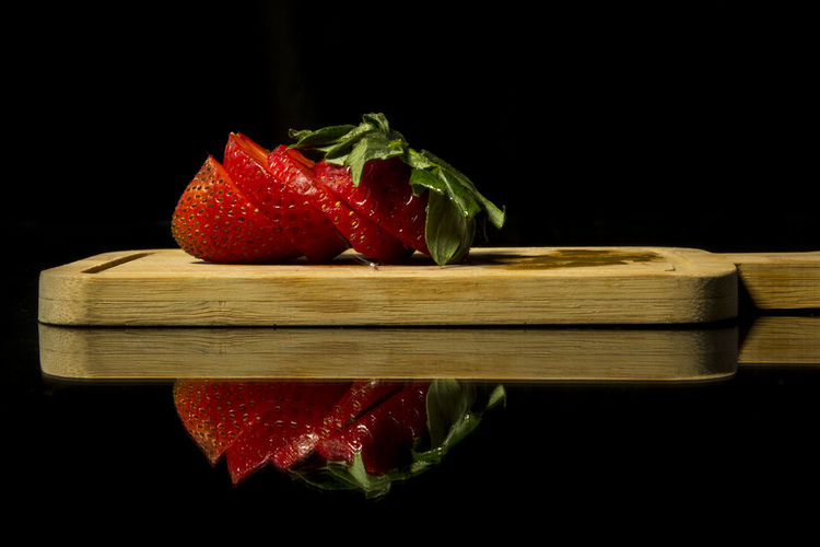 Close-up of strawberries on black background