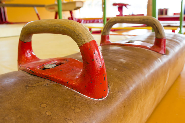 Close-up of pommel horse in gym