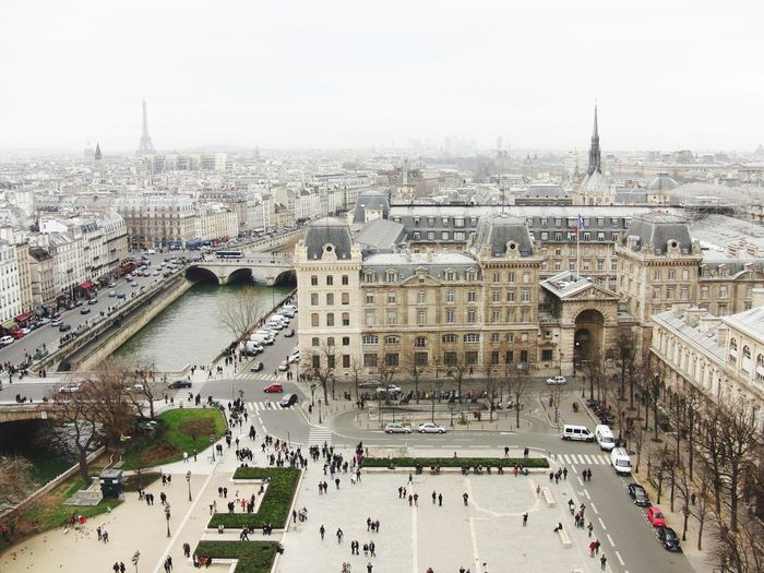 High angle view of people by seine river in city