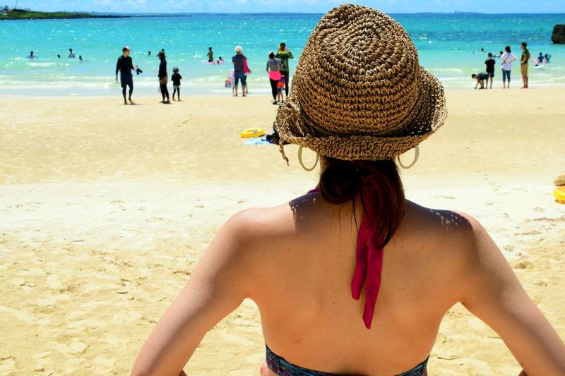 Rear view of woman on beach