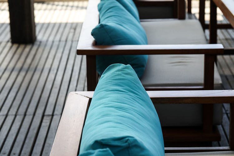 High angle view of cushions on furniture