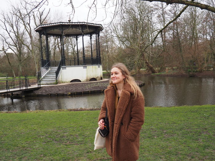 Young woman in park during winter