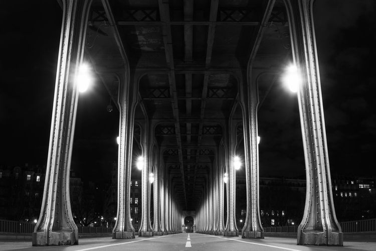 Illuminated pont de bir-hakeim at night