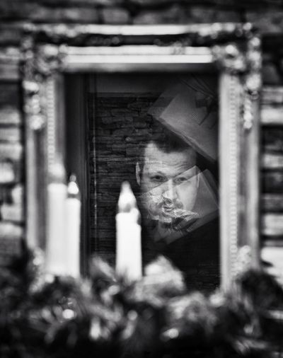 Man in front of building