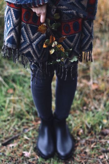 Low section of forest girl wearing shoes standing 