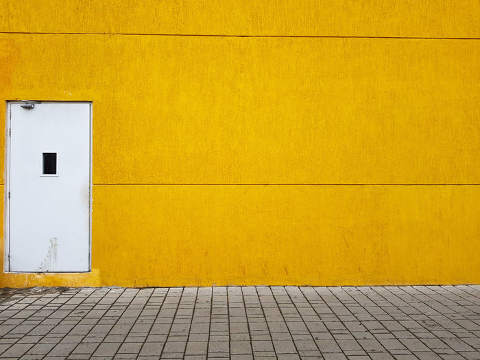 Yellow wall by building