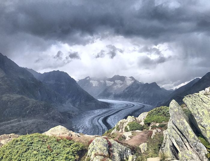 Panoramic view of waterfall against sky