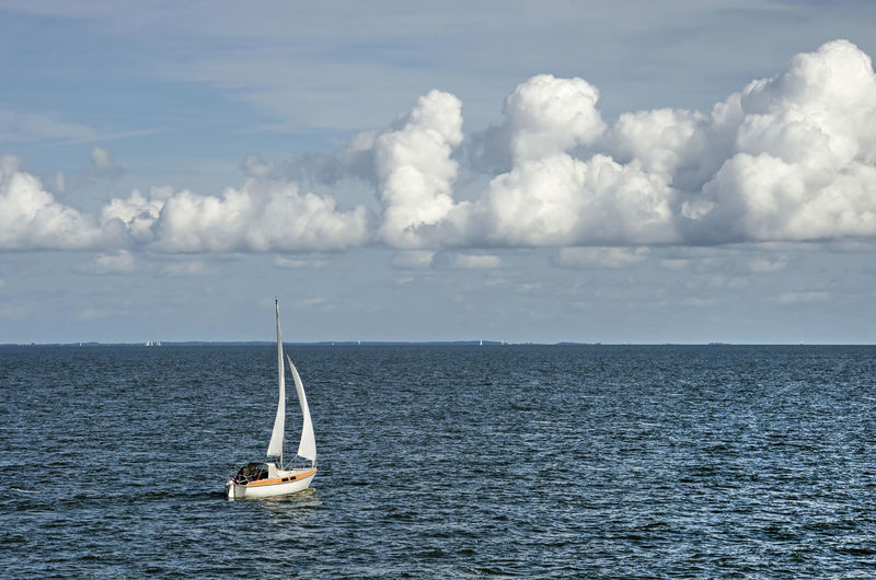 Small sailboat on lake ijsselmeer