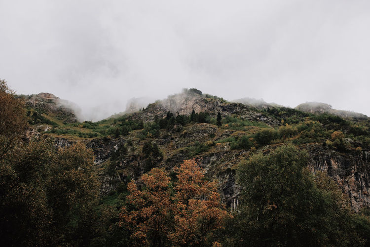 Scenic view of rocky mountains against sky
