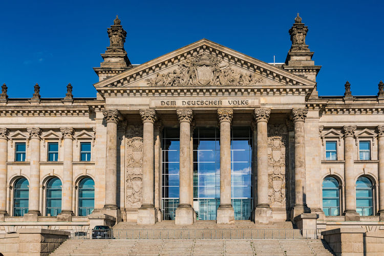 The view worth seeing from the square of the republic on the building of german reichstag in berlin