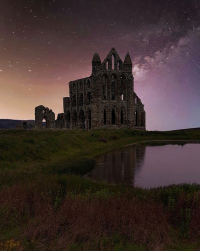The old abbey  against sky at night