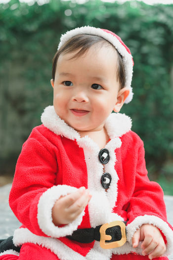 Portrait of cute baby girl in winter