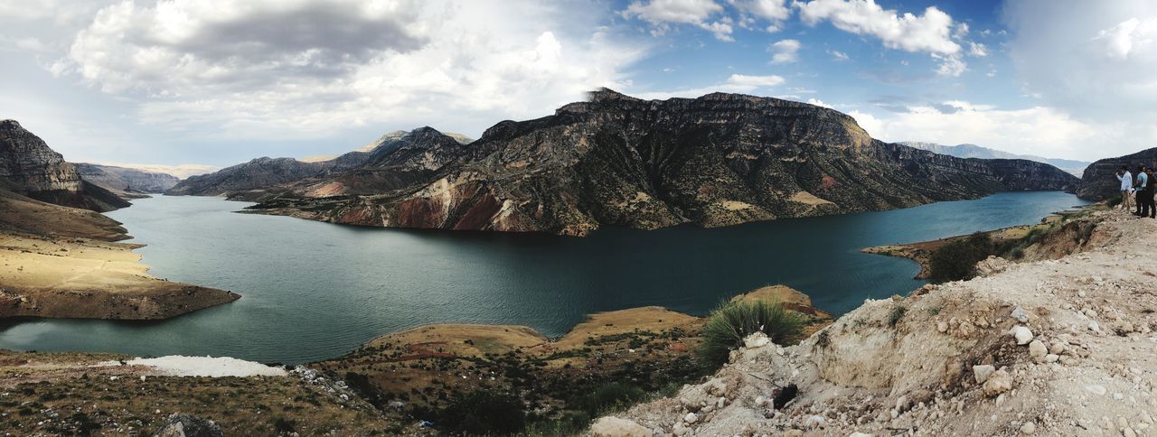 Panoramic view of rocks and mountains against sky