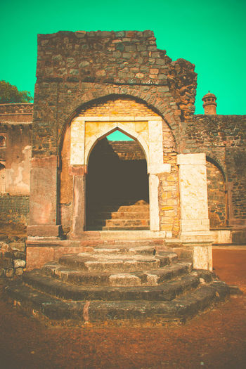 Old ruin building against sky