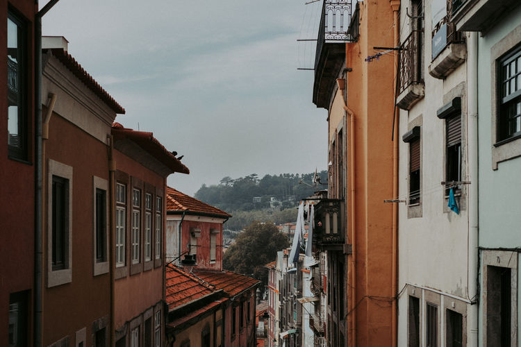 Buildings in city against sky