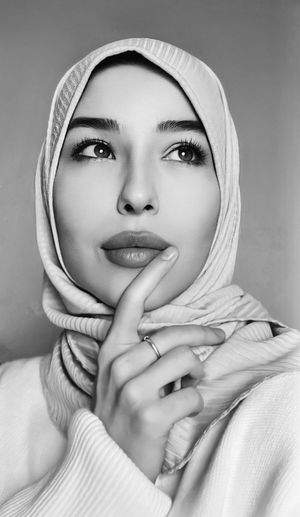 Close-up portrait of young woman wearing hijab