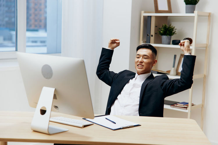 Business colleagues working at desk in office