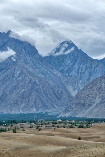 Scenic view of snowcapped mountains against sky