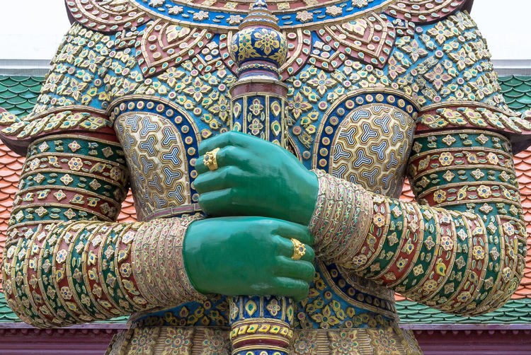Close-up of guardian statue at wat phra kaeo