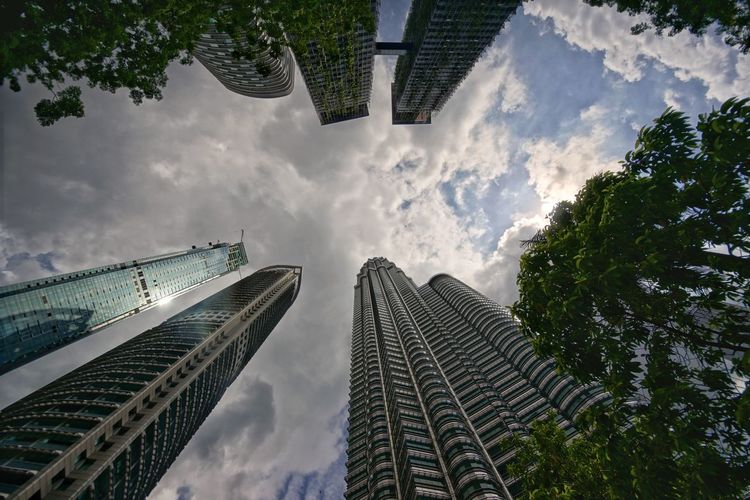 Low angle view of skyscrapers against sky