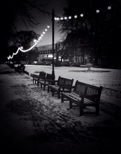 Empty benches in the dark