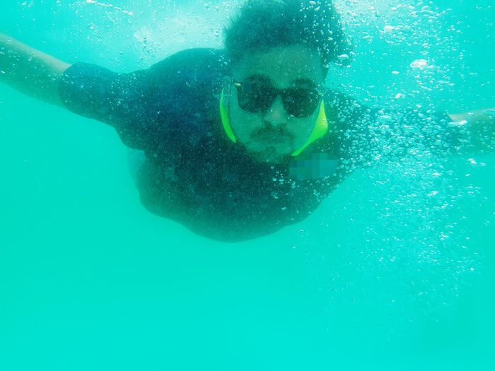 Full length of man swimming in sea