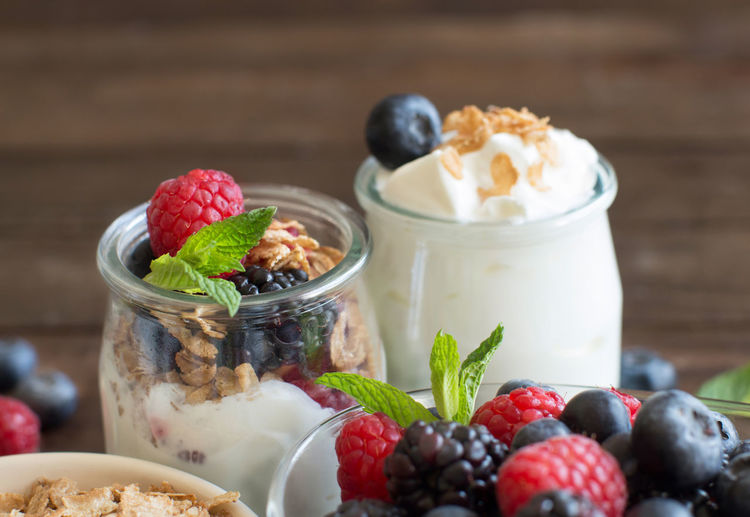 Close-up of fresh fruits with yogurt