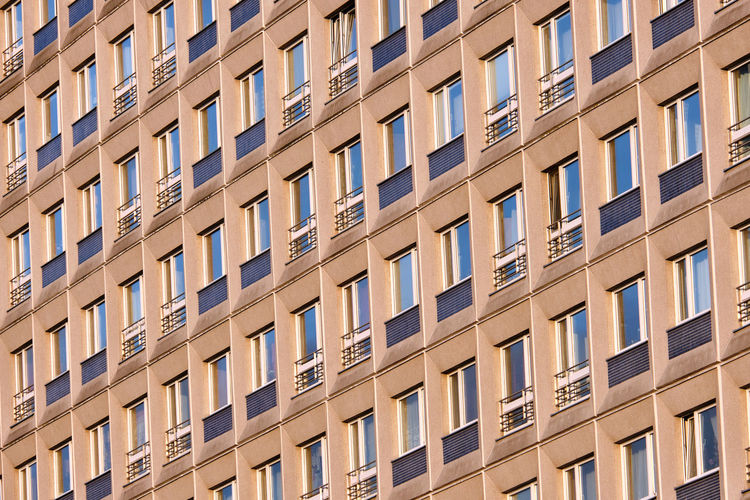 Facade of a typical precast apartment building in the former eastern part of berlin, germany