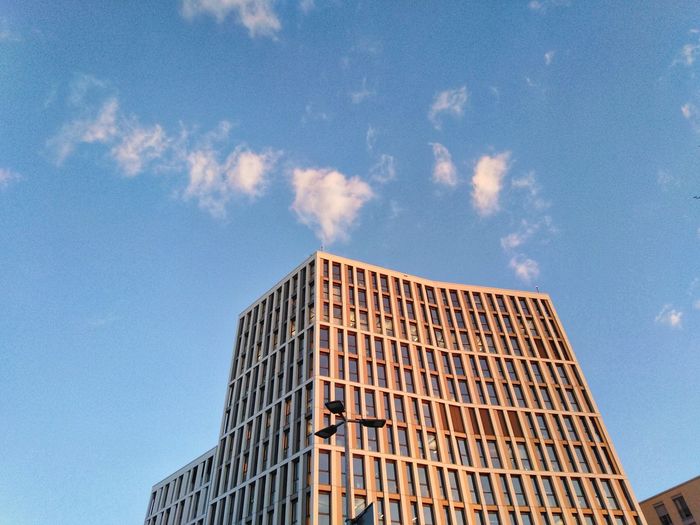 Low angle view of modern building against sky