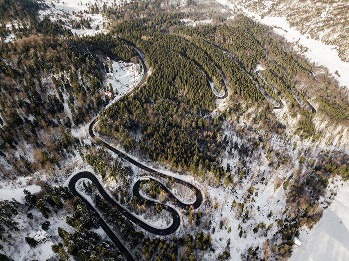 High angle view of road on snow covered landscape