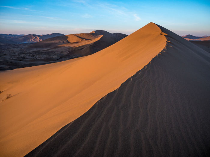 Scenic view of desert against sky