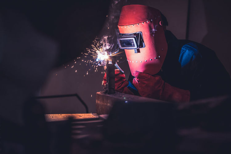 Close-up of man welding in workshop