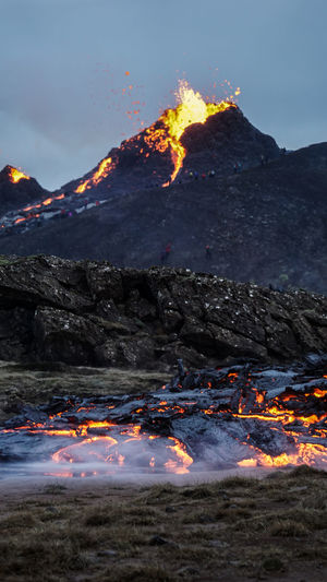 Scenic view of fire on mountain
