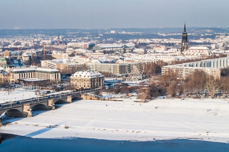 High angle view of cityscape by elbe river during winter