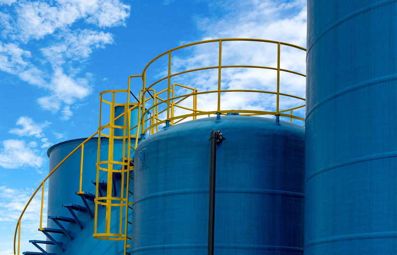 Closeup fuel storage tank in petroleum refinery. blue big tank of oil storage. fuel silo. 