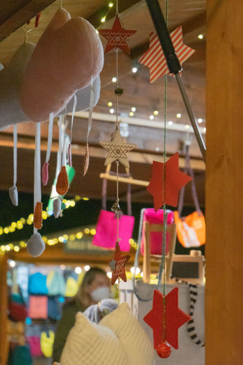 Close-up of illuminated christmas decorations hanging in restaurant