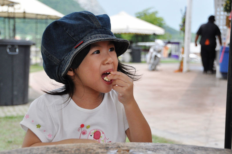 Portrait of cute girl looking away