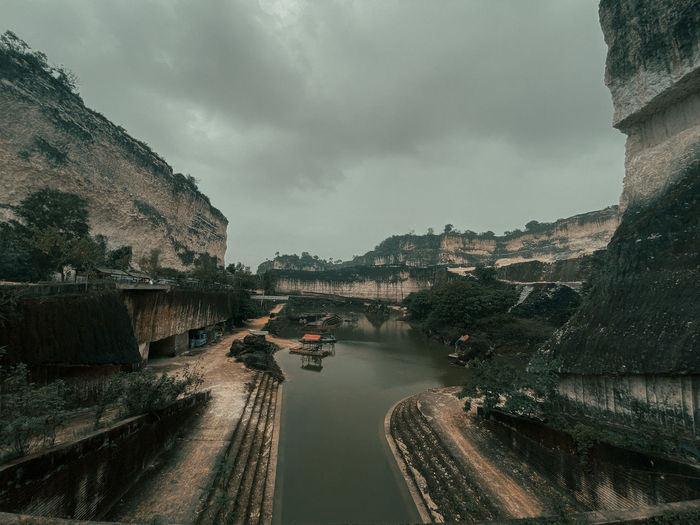 Panoramic view of bridge over road against sky