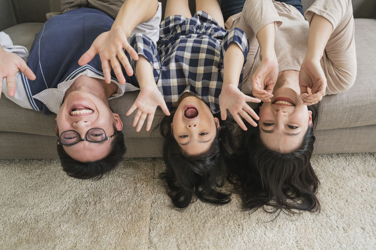 Group of young women lying down on floor