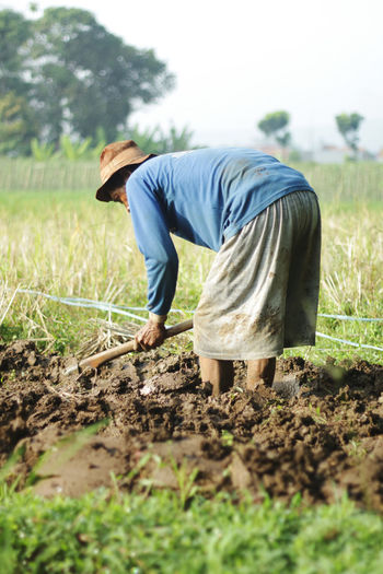 Man working on field