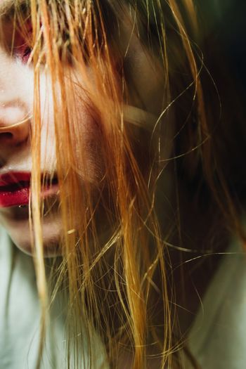 Close-up of young woman with blond hair