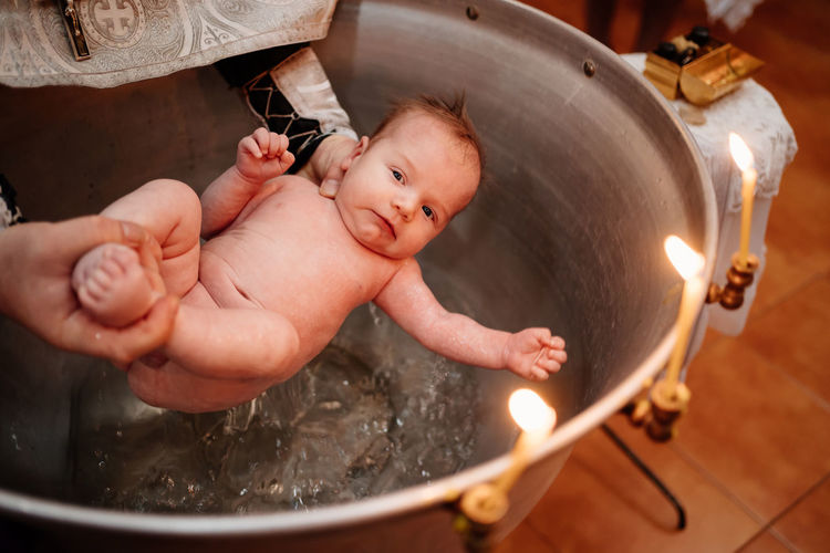 High angle view of baby taking bath