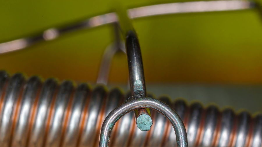 Close-up of spiral metal hanging