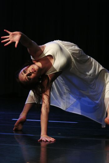 Young dancer performing on stage