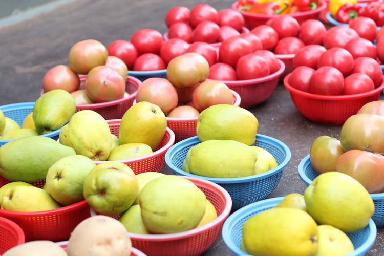 High angle view of fruits in container on floor