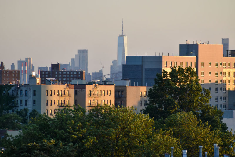 The freedom tower is seen from a distance in new york city.