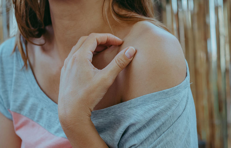 Midsection of woman with hands